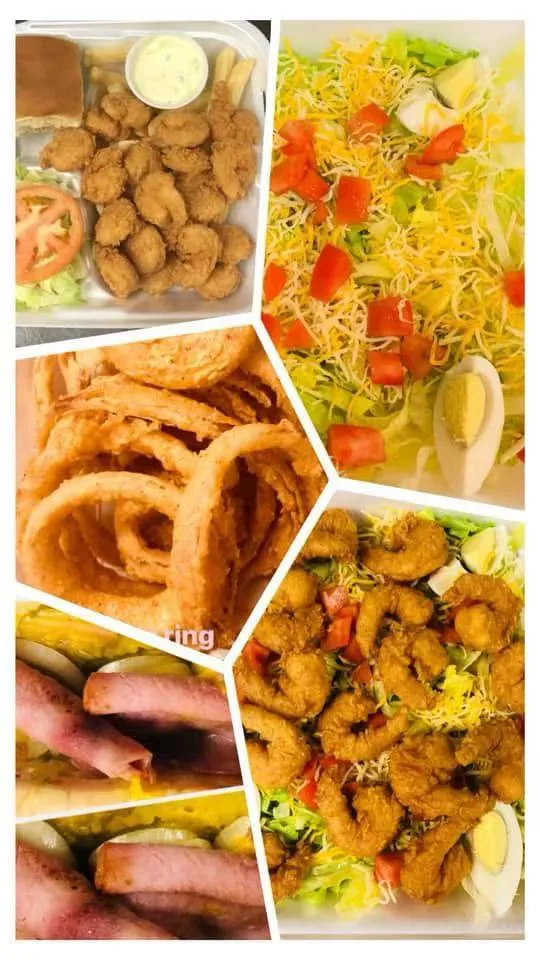 Assorted fast food platter with seafood and sides at Tate Cove Seafood, a Fast-Food Restaurant in Ville Platte