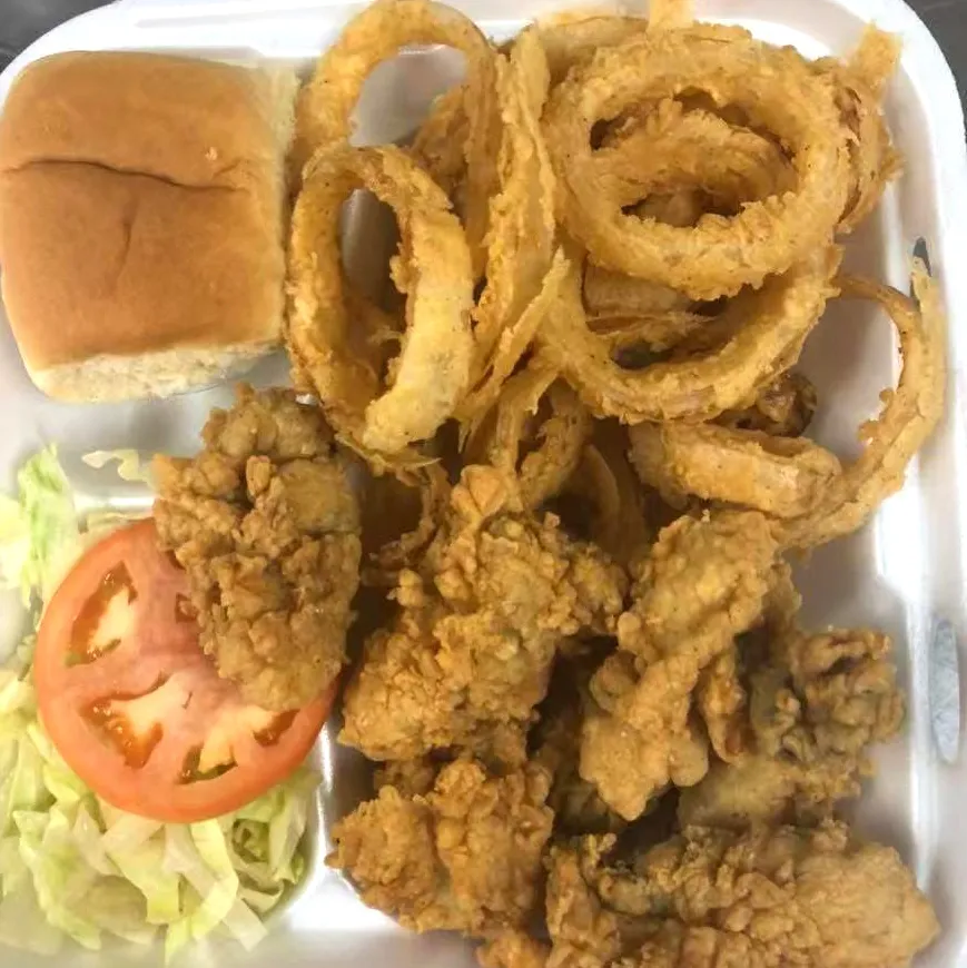 Fried chicken with onion rings combo at Tate Cove Seafood, a Fast-Food Restaurant in Ville Platte