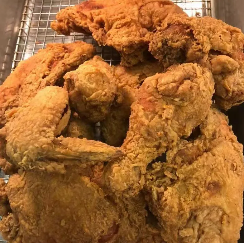 Crispy fried chicken pieces at Tate Cove Seafood, a Fast-Food Restaurant in Ville Platte